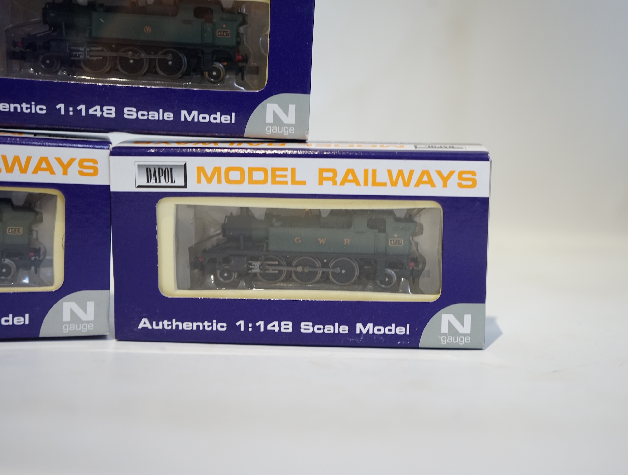 Three boxed Dapol N gauge railway GWR 45xx 2-6-2T locomotives; 4523 (ND-014), 4527 (ND-023), and 4567 (ND-020). Condition - good.